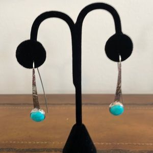 Silpada sterling silver earrings with 2 reconstructed Turquoise droplets.